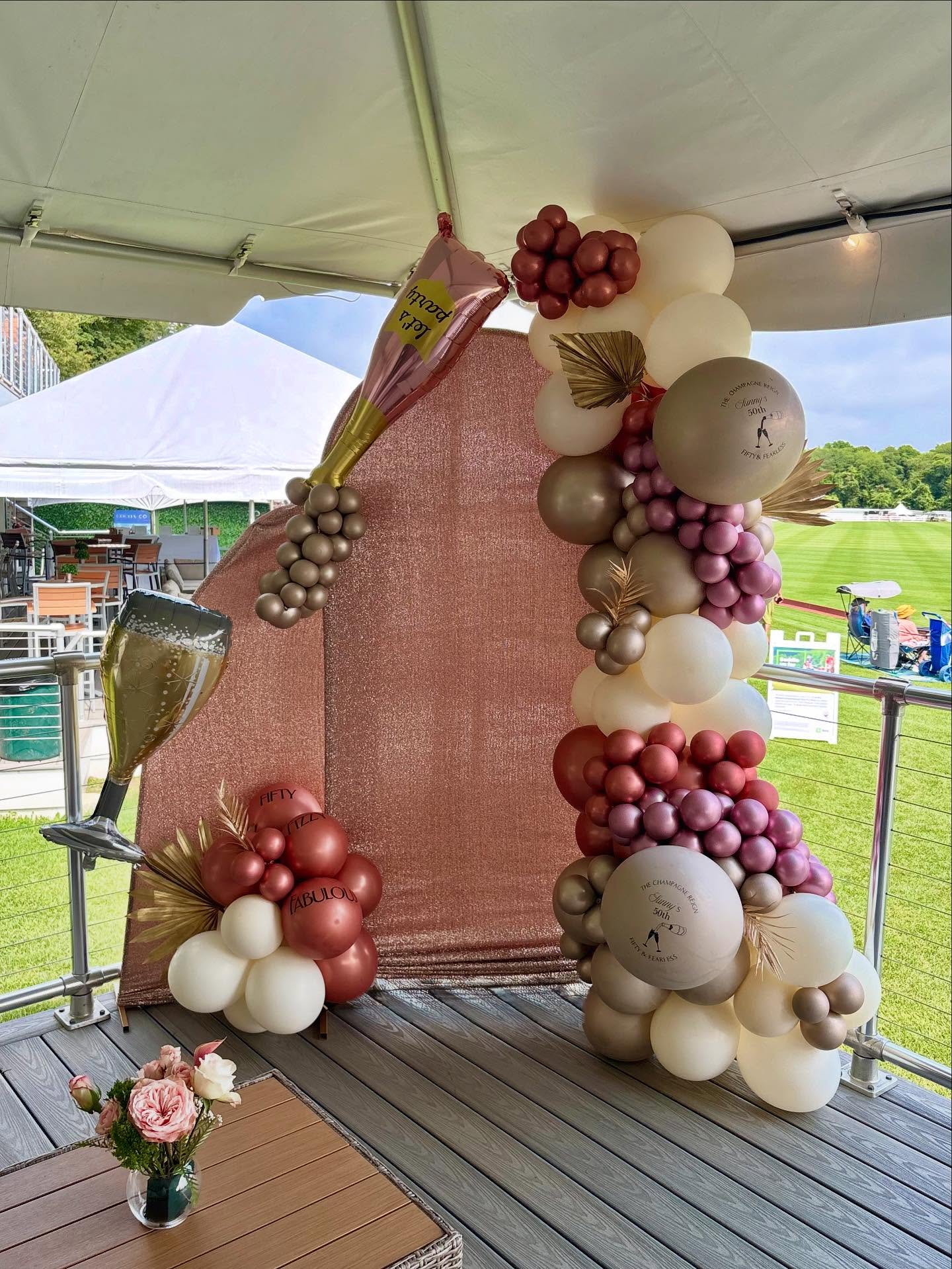 Outdoor balloon arch at Newport Polo event by Caliella