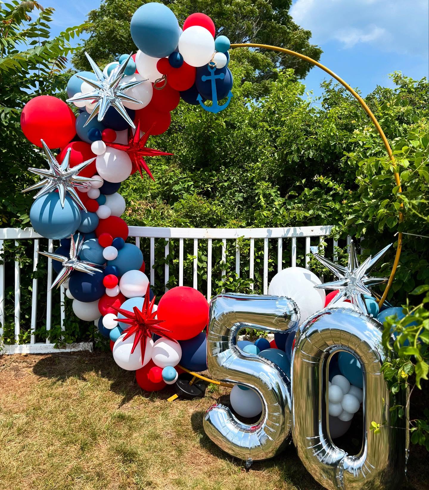50th balloon hoop installation by Caliella