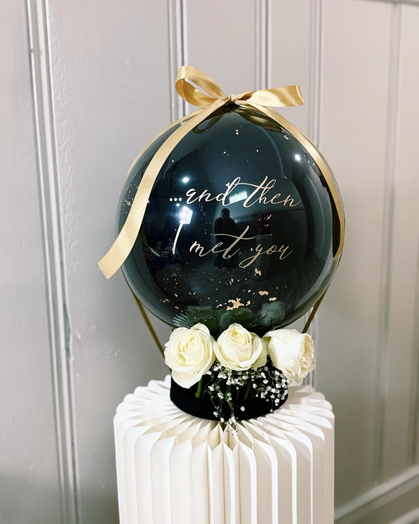 Custom message balloon with 'and then I met you' text, white roses, and elegant styling