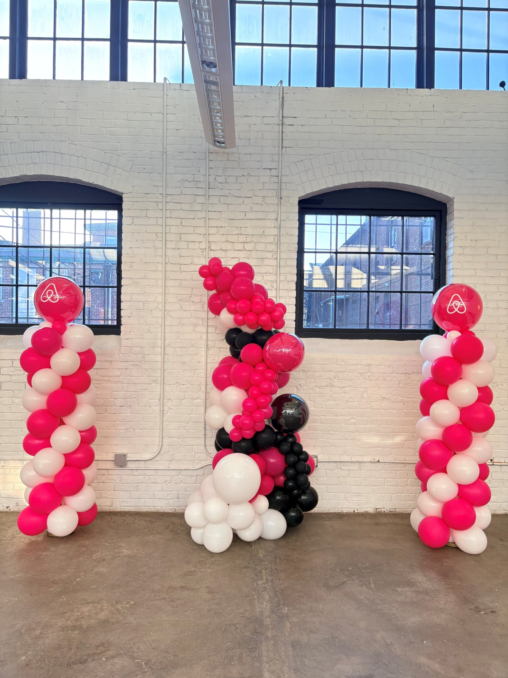 Airbnb branded balloon display by Caliella 2026
