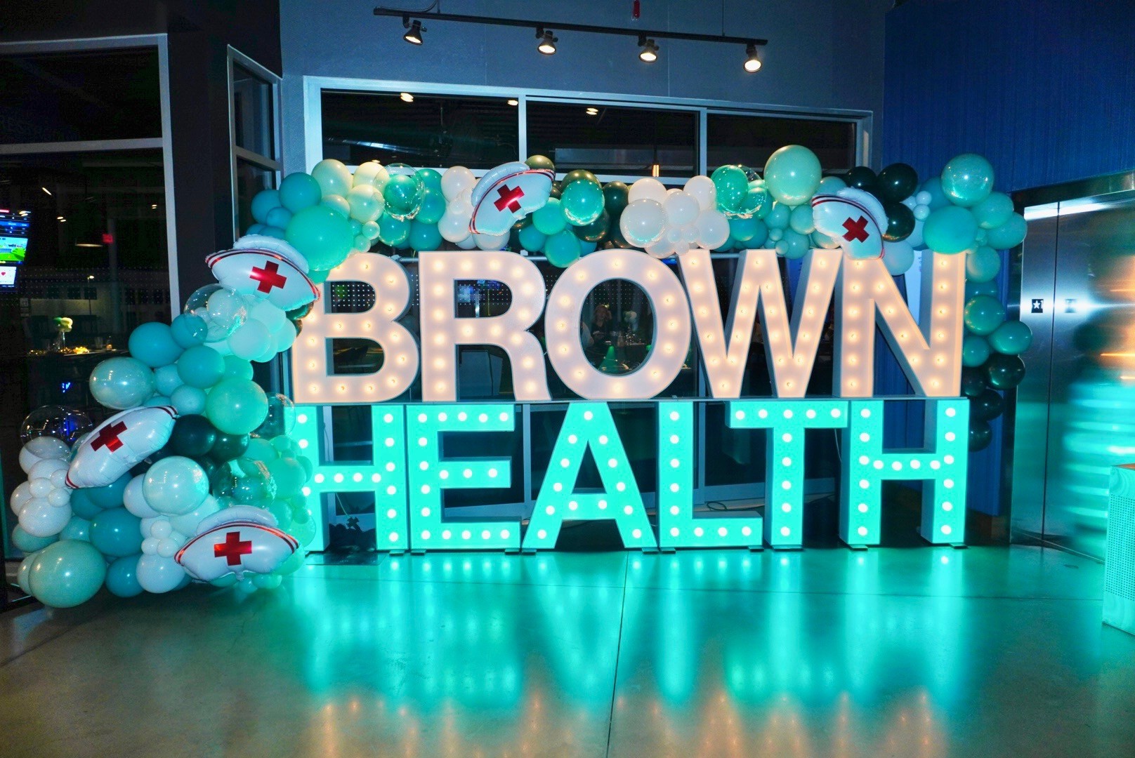Brown Health corporate event balloon installation by Caliella Rhode Island 2026